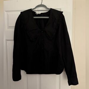 Ganni Blouse. Size 42. Definitely on the smaller side. Ideal for a medium.